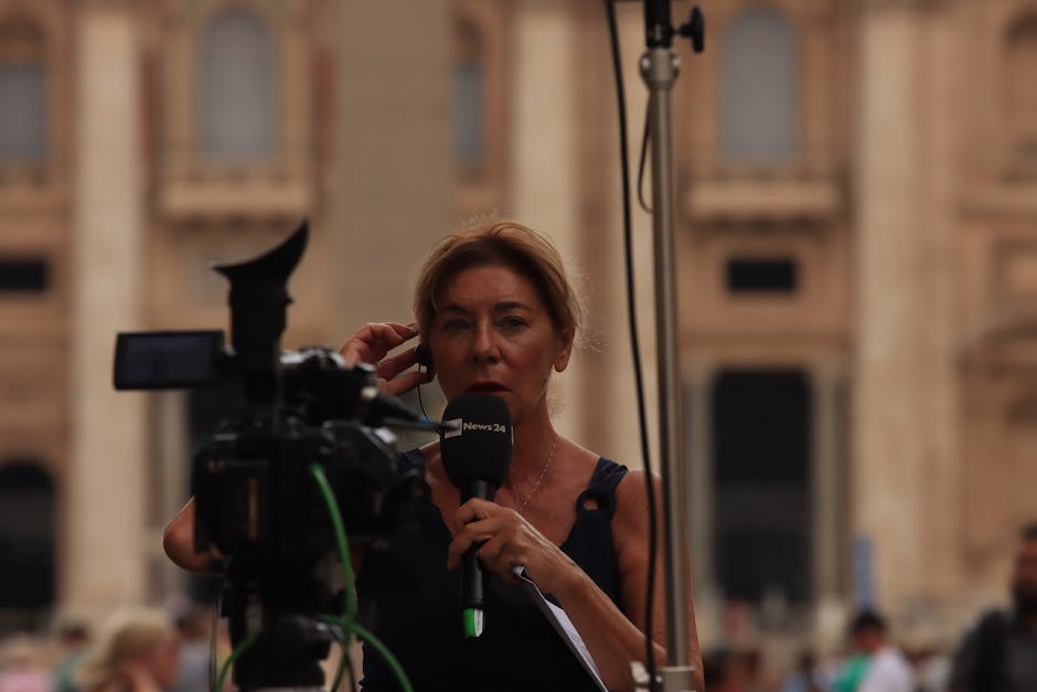 Journalist reporting live from Vatican City, capturing the essence of urban broadcast journalism.